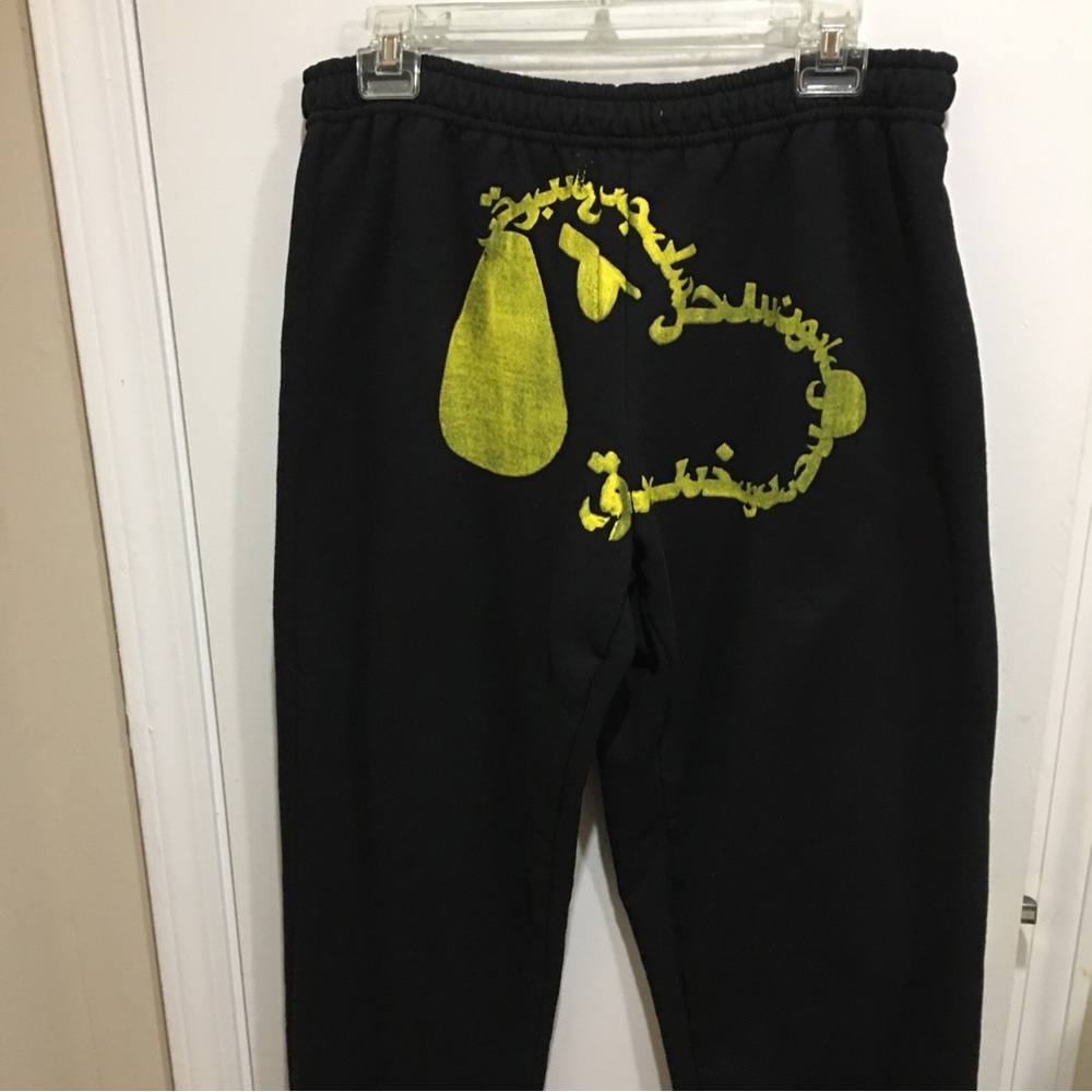 Men's Black Sweatpants with Snoopy Yellow Graphic Detail - Custom Print